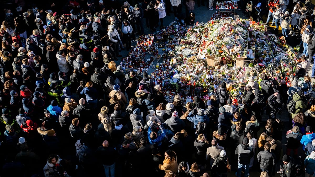 Hundreds march in silence to honour Swiss Alps bar fire victims