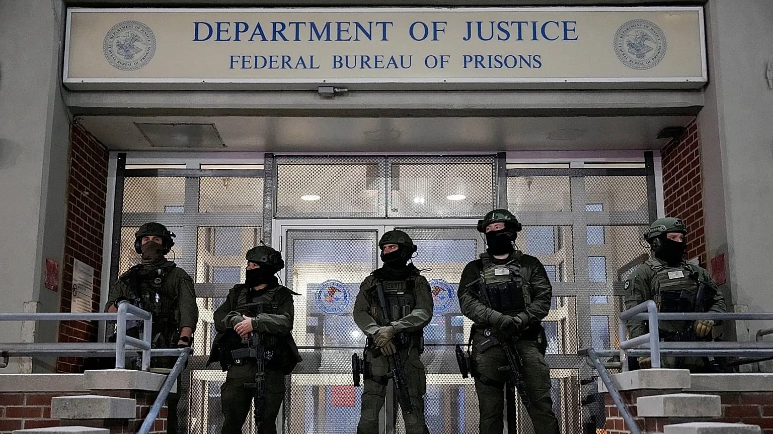 Federal law enforcement personnel stand watch outside the Metropolitan Detention Center in NYC as they await the arrival of captured Nicolas Maduro on Saturday, 3 Jan 2026