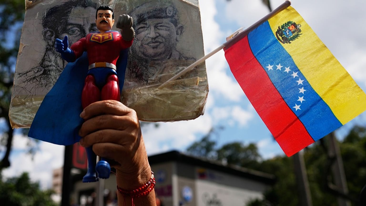Government supporters burn a US flag after Trump announced that US forces had captured Venezuelan President Maduro and his wife, in Caracas, Venezuela, Saturday, Jan. 3, 2026