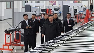 In this photo provided by the North Korean government, its leader Kim Jong Un visits a major munitions factory at an undisclosed place in North Korea Saturday, Jan. 3, 2026.