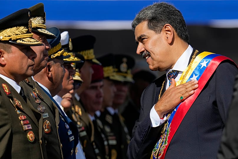 Venezuela's President Nicolás Maduro places his hand over his heart while talking to high-ranking officers in Caracas, 10 January, 2025