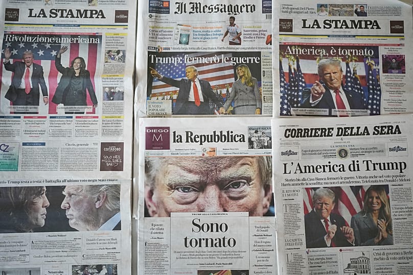 A view of the front pages of Italian newspapers reporting on Donald Trump's win in the US presidential election in Rome, 7 November, 2024