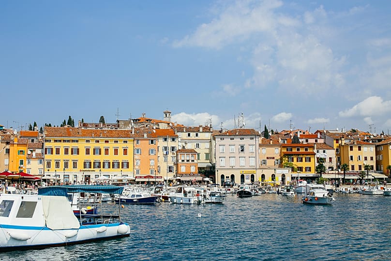 Docked watercrafts near buildings in Rovinj, Croatia