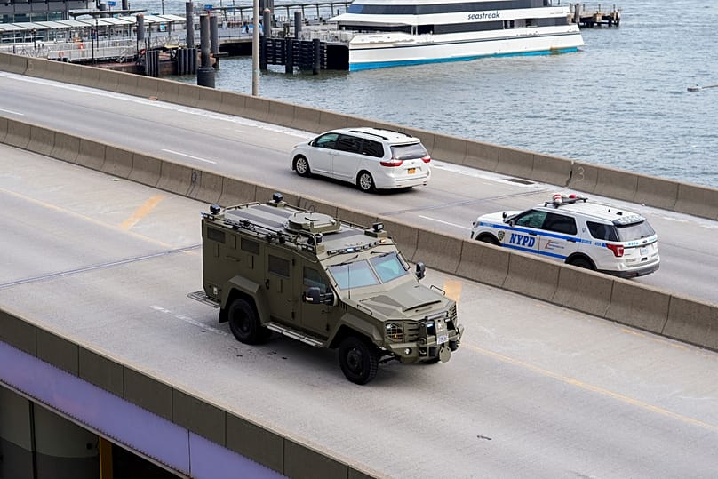 An armoured vehicle makes its way down the FDR Drive after leaving Manhattan Federal Court, 5 January, 2026