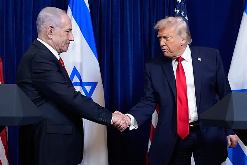 US President Donald Trump shakes hands with Israel's Prime Minister Benjamin Netanyahu at a news conference at Mar-a-Lago, 29 December, 2025