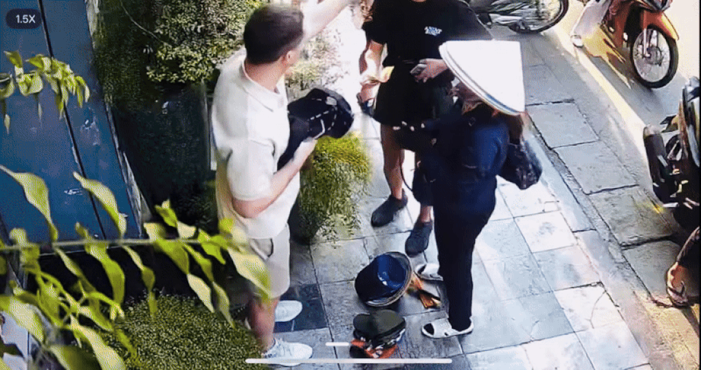 Phạt người chặt chém khách Tây 850.000 đồng một nón lá ở phố cổ Hà Nội - 2