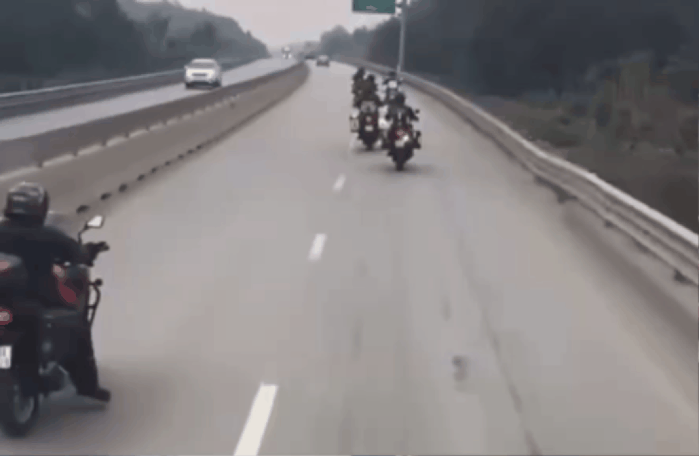 Xử phạt 11 người nước ngoài lái mô tô phân khối lớn đi vào cao tốc - 1